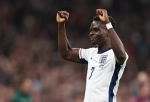 Bukayo Saka mừng siêu phẩm. (Nguồn: Getty Images)