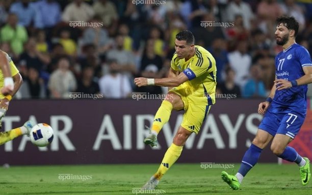 Với 2 bàn thắng vào lưới Al Najma, chân sút người Bồ Đào Nha đang dần chinh phục cột mốc lịch sử. Ảnh: EPA.